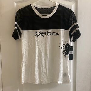 Bebe white Tee shirt with netting on chest and arm area